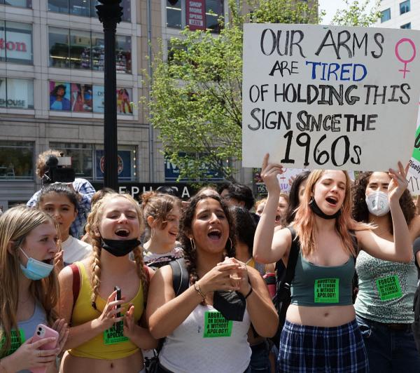 New York City students who walked out for abortion rights with sign My Arms Are Tired