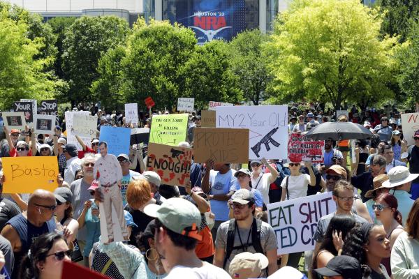 Thousands at NRA convention in Houston, Texas protest gun violence.