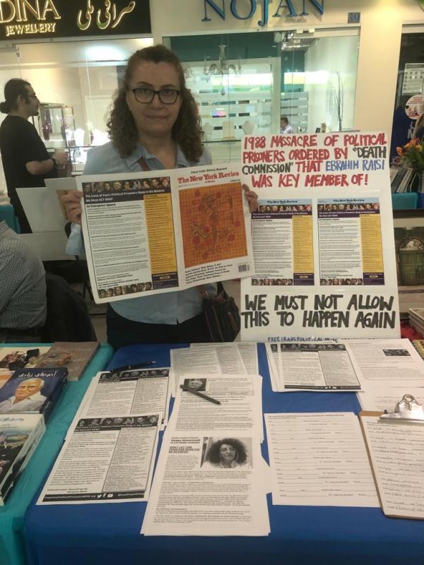 International Emergency Campaign table at Books Without Borders, Toronto