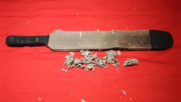 Strap made of steel mesh, used to whip Native American children, c1900.