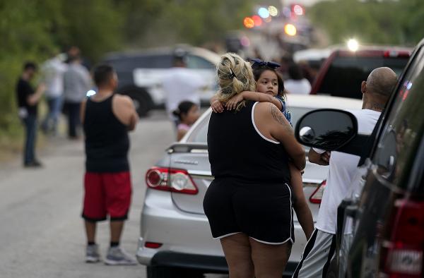 Scene where at least 53 immigrants suffocated in back of trailer.