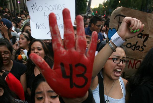 People protest the disappearance of 43 students in Mexico City, October 22, 2014.