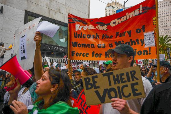 In San Francisco, thousands march for Iran, here with Break the Chains banner.
