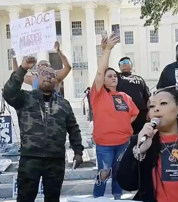 Loved ones and supporters of Alabama prisoner's strike rally at Alabama State House.