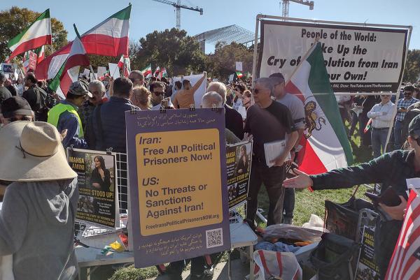 Washington, DC, October 22, 2022: People of the World banner and posters at rally