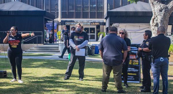 RevComs at SoCal resist police attempts to shut down speak out event, October 29, 2022.