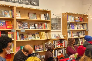 Andy Zee spoke at the holiday open house and fundraiser held at Revolution Books in NYC on December 11.