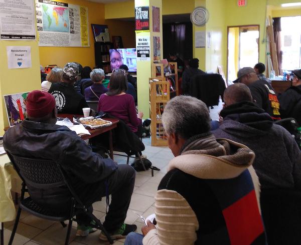 Chicago, IWD 2023, watching video at Revolution Center.