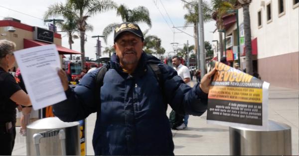 Helping the REVCOMS distribute the broadsheet.