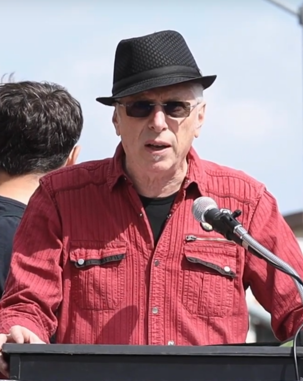 Andy Zee speaking on May 1st 2023 in Los Angeles