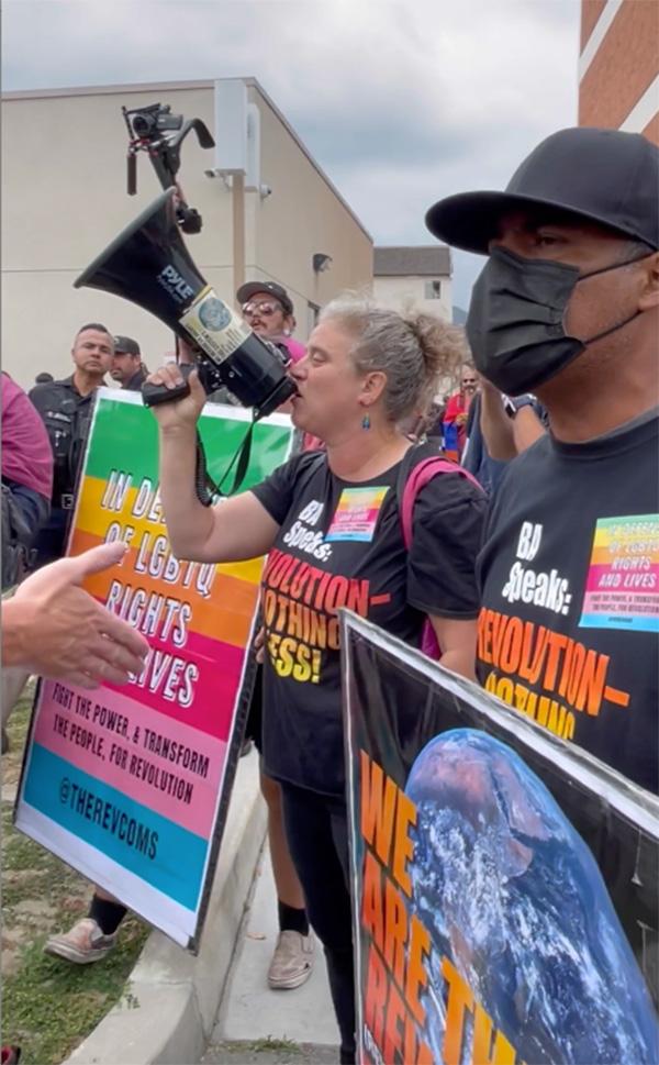 RevComs protest at California school board meeting.