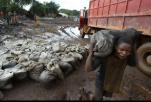 Child laborer in coltan mine