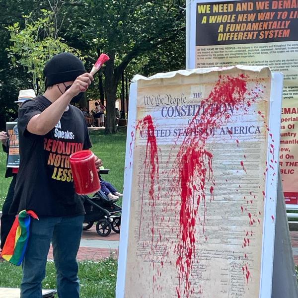 The U.S. Constitution is splattered with red paint on July 4, 2023, Independence Hall, Philadelphia.