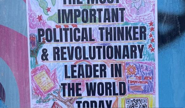 Austin, Texas, RevComs decorated wall with RevCom posters.