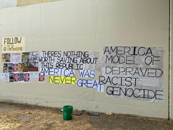 Revcoms poster response to defaced wall: "Theres nothing worth saving about this republic. America was never great.