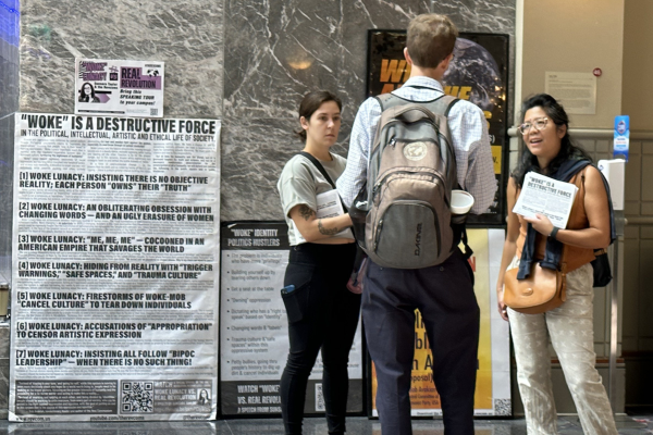 RevComs talk to attendees at American Sociological Association convention in Philadelphia.