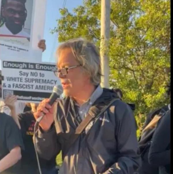 Paul Street protesting at Jason Aldean concert in Tinley Park.
