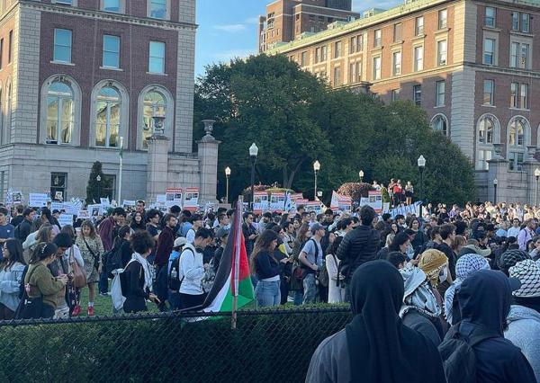 Pro-Palestinian Columbia Students fill the quad, chanting loudly.