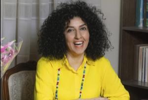 Narges Mohammadi in yellow sweater