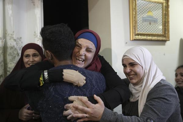 Israa Jaabis is embraced by her family after spending 8 years in an Israeli prison. 
