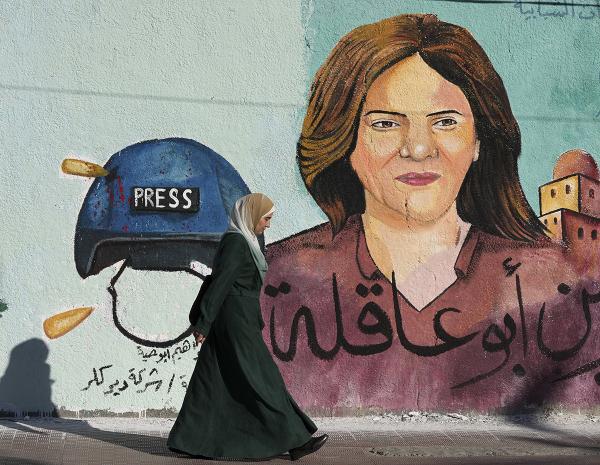 A mural of Al Jazeera journalist Shireen Abu Akleh who was shot dead by the Israeli military during a raid in the West Bank town of Jenin, September 2022.