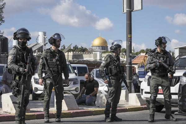 Israeli forces prevent Palestinian Muslim worshipers from entering the Al-Aqsa Mosque, November 17, 2023.