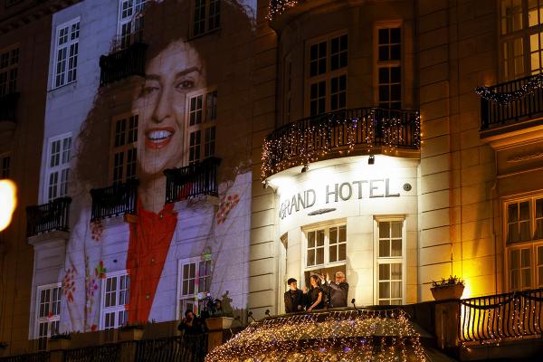 Narges Mohammadi won Nobel Peace Price for her decades of battle for women's rights in Iran. Her image is projected on building in Oslo, Norway, December 10, 2023