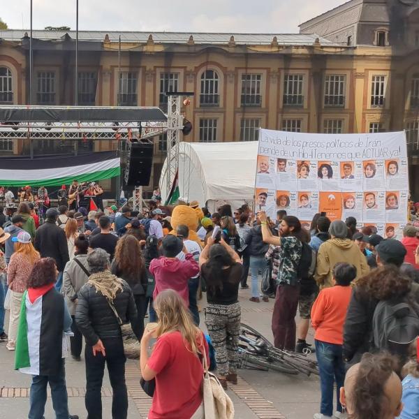 comrevco February 23, 2024, banners in defense of Iranian political prisoners and against Israeli genocide