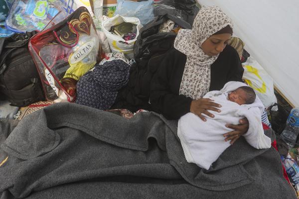 Displaced by Israeli air and ground offensive, this new Palestinian mother confronts the need for basic necessities, January 14, 2024.