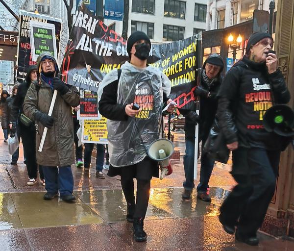 Chicago, IWD, marching in the rain.