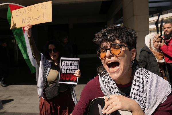 Lebanese woman shouts slogans during a protest to support the Palestinian women, March 8, 2024.