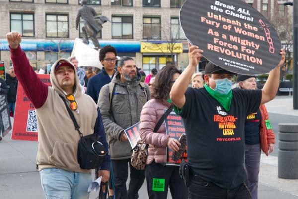IWD Harlem New York, people join march.