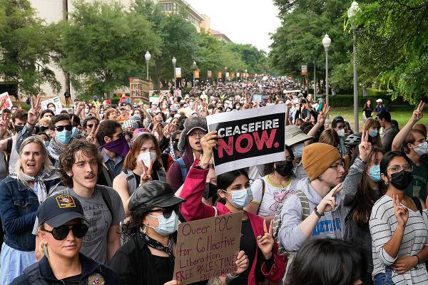 Pro-Palestinian protesters march at the University of Texas, Wednesday, April 24, 2024, in Austin, Texas.