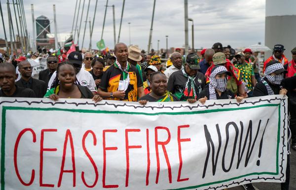 Pro-Palestinians march across the Mandela Bridge, Johannesburg, South Africa, November 29, 2023. 
