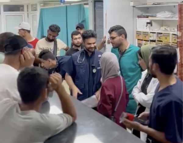 Dr. Majed Jabar with staff at the European Gaza Hospital