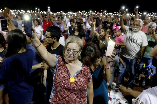 August 4, 2019, more than a thousand people mourn the victims of a mass shooting at a Walmart in El Paso, Texas.