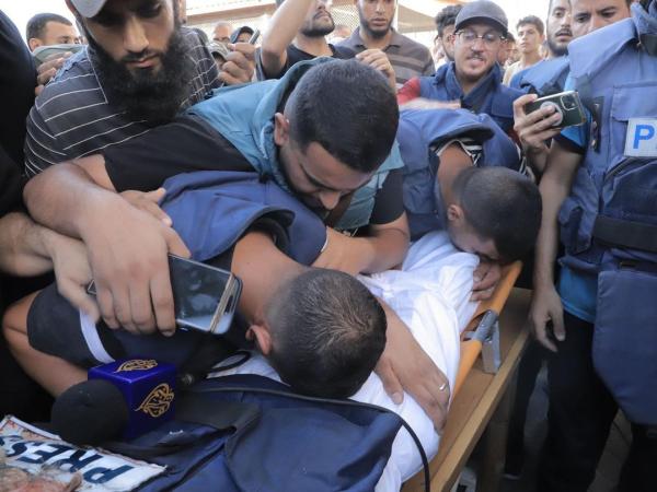 Colleagues bid farewell to Ismail Ghoul and Rami Al-Rifi after they were targeted directly while returning from coverage from Gaza City.