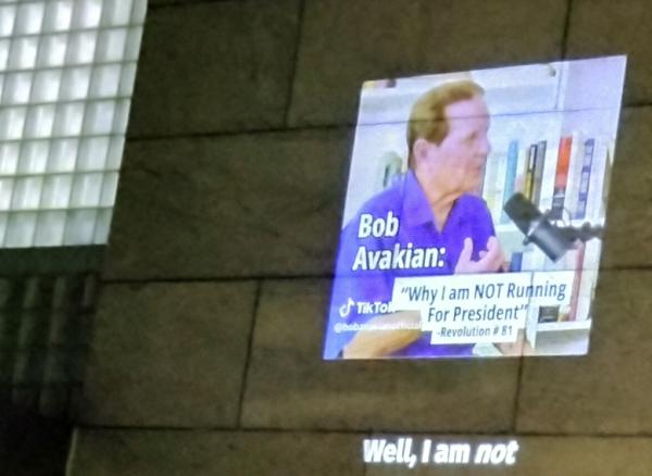 Projection of @BA Official on wall