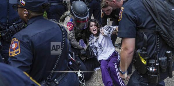 Pro-Palestinian protesters under arrest at the University of Texas, Austin, April 24, 2024. 