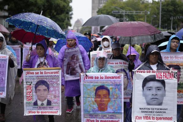 In the rain, Mexico City demonstration remembers 43 students, September 26, 2024.