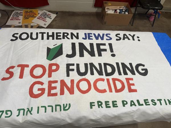 Banner calls for end to funding the genocide of Palestinians, Dallas, November 14, 2024.