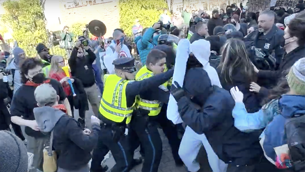 Cops charge counter-protesters to the Boston Men's March Against Abortion.