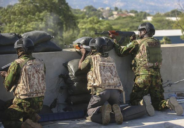 Kenyan police exchange fire with gang members in Port-au-Prince, December 5, 2024. 