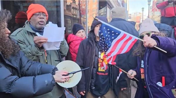 Carl Dix and revcoms burn the US flag on Trump inauguration day in Washington DC 
