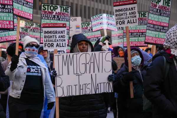 Anti-Trump protesters at Federal Plaza in Chicago demanding immigrant rights, January 20, 2025.