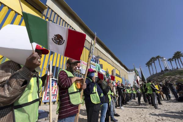 Migrants and advocates protest Trump's attacks on immigrants and asylum seekers near the border between Mexico and the U.S., January 19, 2025.
