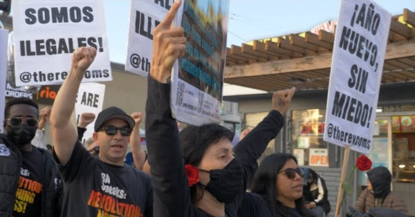 Revcoms marching through immigrant neighborhoods, MacArthur Park, Los Angeles.