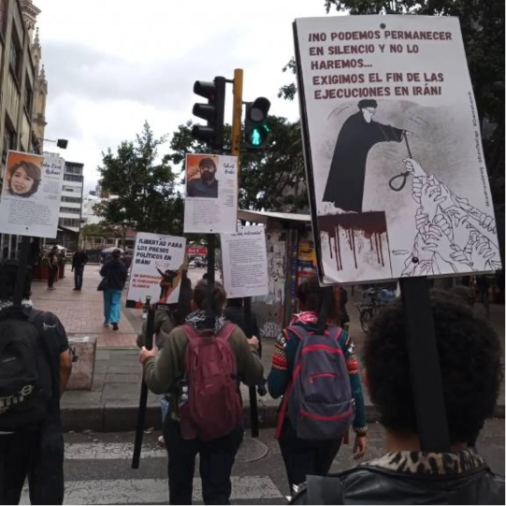 Bogotá, Colombia march, January 28, 2025. Poster reads “We cannot and will not remain silent. We demand an end to executions in Iran!.”