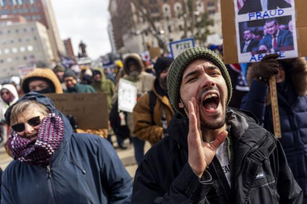 Lansing, Michigan, February 17, 2025, protest, guy chanting.