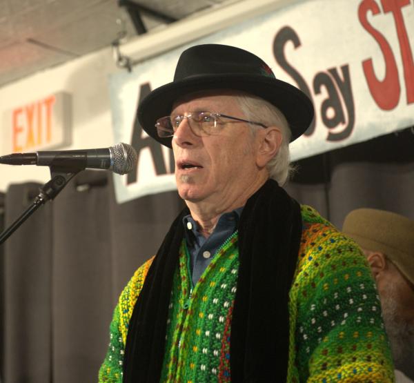 Andy Zee speaks at the Revolution Books event, February 20, 2025.